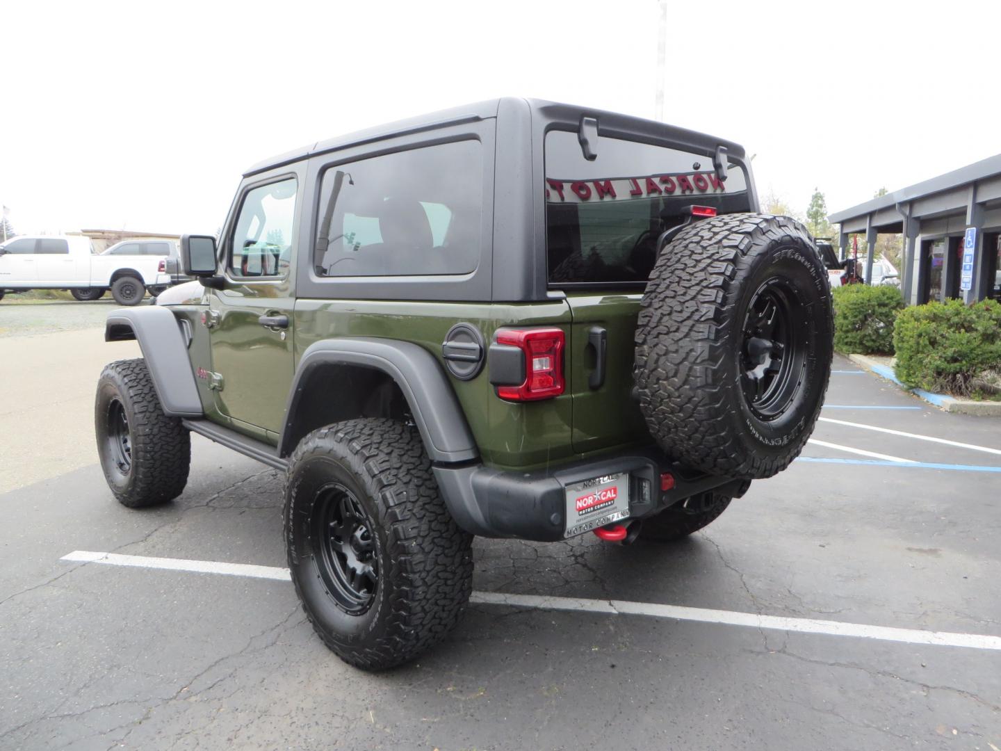 2021 Sarge Green /BLACK Jeep Wrangler Rubicon (1C4HJXCN4MW) with an 2.0L L4 DOHC 16V TURBO engine, 6A transmission, located at 2630 Grass Valley Highway, Auburn, CA, 95603, (530) 508-5100, 38.937893, -121.095482 - Rubicon featuring a Mopar suspension system, Fox shocks, 17" Fuel Wheels, BFG KO2 tires, Maxximus 3 front bumper stinger, Dual exhaust, Bolt hitch lock, Mopar HD tailgate hinge, and a custom cargo platform. - Photo#6